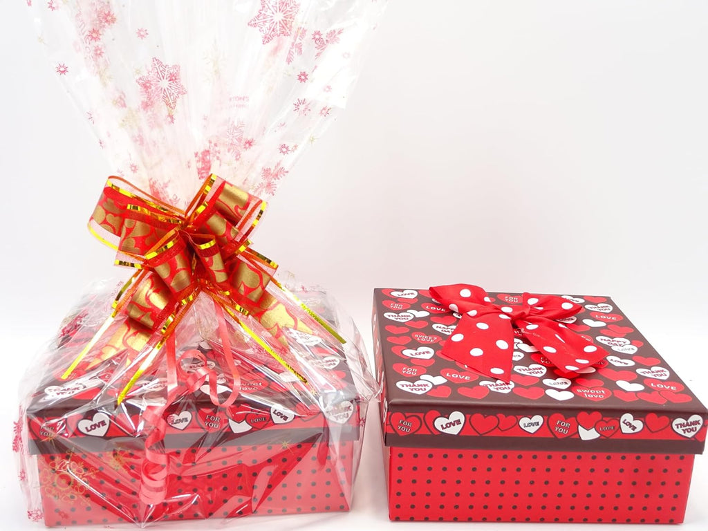 Side by side of the gift box and hamper, showcasing the red gift wrap and gold bow for a luxurious look