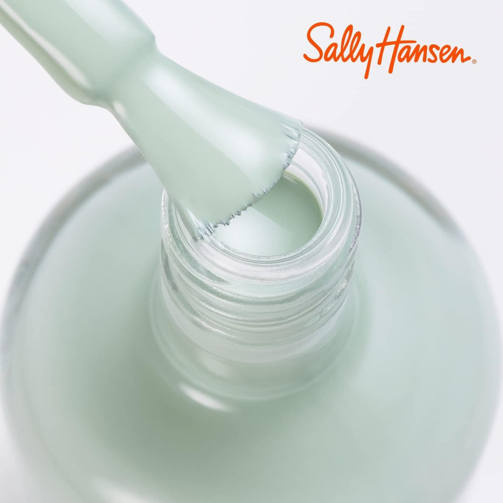Close-up of Sally Hansen Miracle Gel 290 Grey Matters brush dipped in teal green nail polish