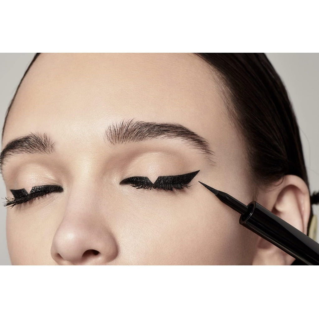 Woman applying LOreal Paris Ultra Precision Superliner Eyeliner Black