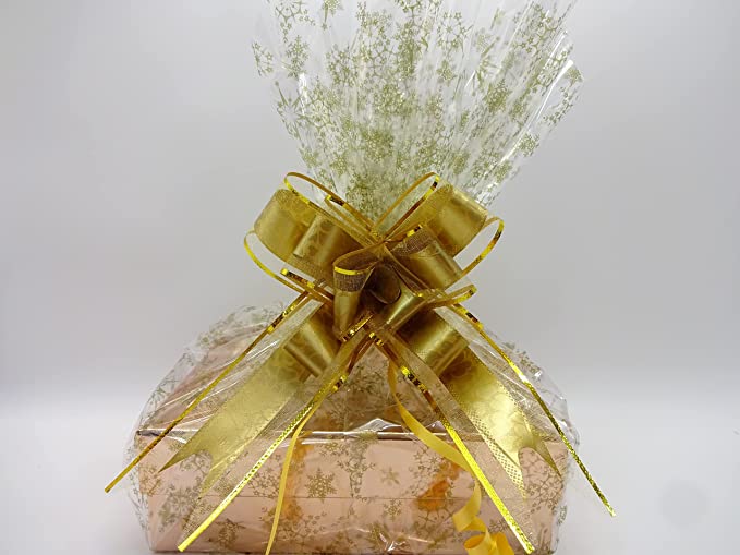 Boots No7 Limited Edition makeup and skincare gift hamper wrapped in gold packaging with a large gold bow.