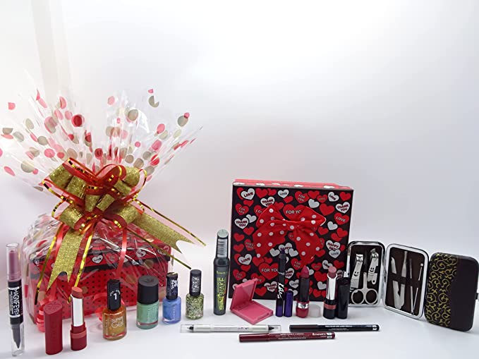 Complete Rimmel 14-piece makeup gift hamper including nail polishes, lipsticks, manicure kit, and more.