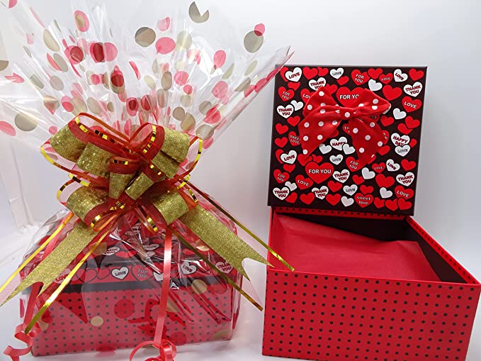 Rimmel makeup gift box hamper with all 14 items and a free manicure tool kit, elegantly presented in a decorated box."