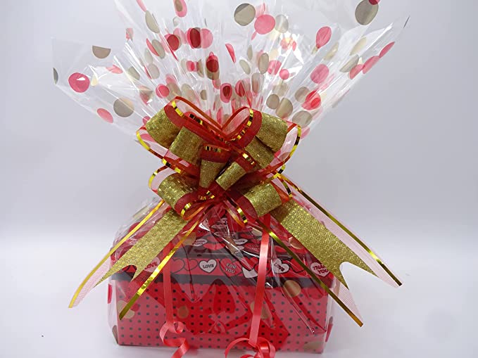 Rimmel 14-piece makeup gift box hamper beautifully wrapped with red and gold ribbon, ready for gifting